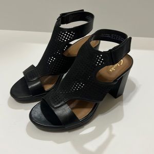 Black Clark’s with 4in heel, very comfortable size 7, worn couple of times.